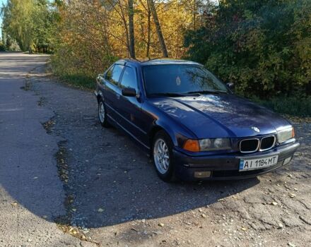 Синий БМВ 320, объемом двигателя 2 л и пробегом 300 тыс. км за 1850 $, фото 1 на Automoto.ua
