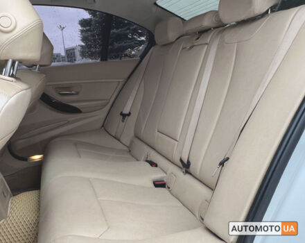 Белый БМВ 320и, объемом двигателя 2 л и пробегом 180 тыс. км за 13600 $, фото 9 на Automoto.ua