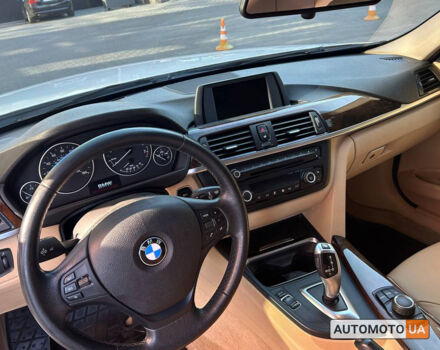 Белый БМВ 320и, объемом двигателя 2 л и пробегом 136 тыс. км за 13600 $, фото 7 на Automoto.ua