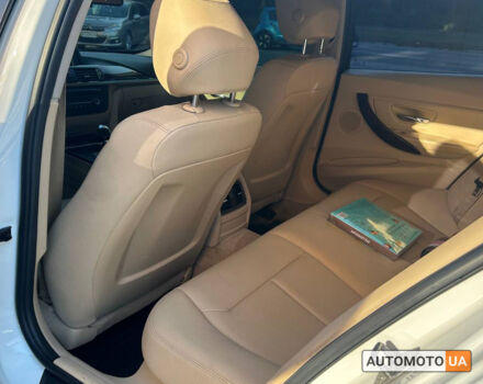 Белый БМВ 320и, объемом двигателя 2 л и пробегом 136 тыс. км за 13600 $, фото 13 на Automoto.ua