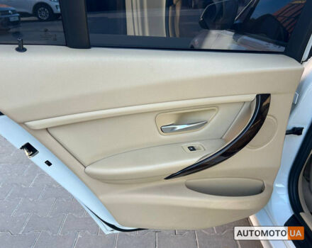 Белый БМВ 320и, объемом двигателя 2 л и пробегом 136 тыс. км за 13600 $, фото 12 на Automoto.ua