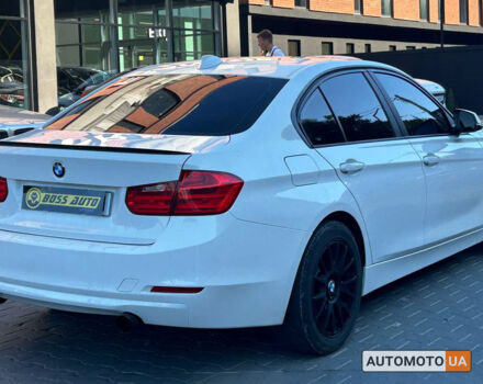 Белый БМВ 320и, объемом двигателя 2 л и пробегом 136 тыс. км за 13600 $, фото 5 на Automoto.ua