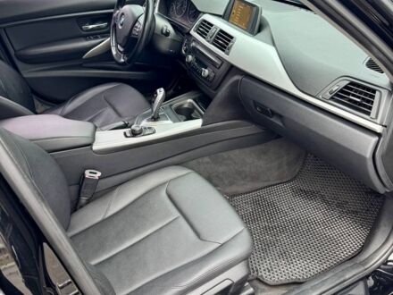 Черный БМВ 328i, объемом двигателя 2 л и пробегом 0 тыс. км за 9900 $, фото 1 на Automoto.ua
