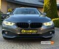 Серый БМВ 418, объемом двигателя 2 л и пробегом 165 тыс. км за 21700 $, фото 1 на Automoto.ua
