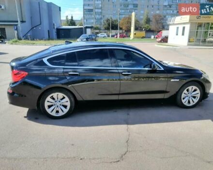 Черный БМВ 5 Серия ГТ, объемом двигателя 2.98 л и пробегом 250 тыс. км за 11800 $, фото 1 на Automoto.ua