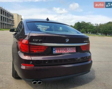 Красный БМВ 5 Серия ГТ, объемом двигателя 3 л и пробегом 286 тыс. км за 20450 $, фото 21 на Automoto.ua