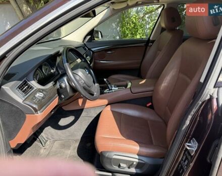 Красный БМВ 5 Серия ГТ, объемом двигателя 2 л и пробегом 170 тыс. км за 23000 $, фото 1 на Automoto.ua