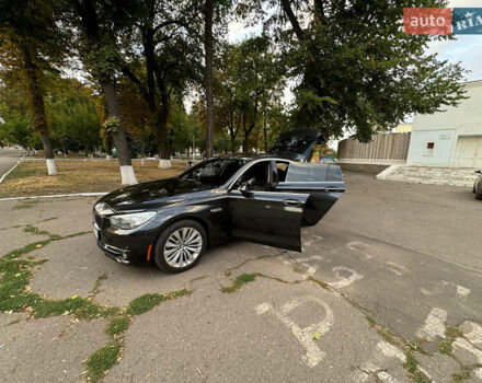 Серый БМВ 5 Серия ГТ, объемом двигателя 3 л и пробегом 230 тыс. км за 19000 $, фото 6 на Automoto.ua