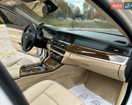 Белый БМВ 5 Серия, объемом двигателя 2 л и пробегом 125 тыс. км за 13499 $, фото 44 на Automoto.ua