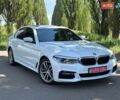 Белый БМВ 5 Серия, объемом двигателя 2 л и пробегом 156 тыс. км за 28200 $, фото 1 на Automoto.ua