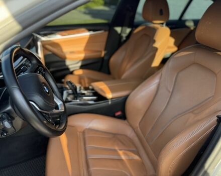 Белый БМВ 5 Серия, объемом двигателя 2 л и пробегом 123 тыс. км за 23999 $, фото 5 на Automoto.ua