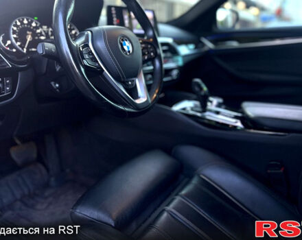 Белый БМВ 5 Серия, объемом двигателя 3 л и пробегом 131 тыс. км за 38500 $, фото 4 на Automoto.ua