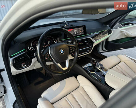 Белый БМВ 5 Серия, объемом двигателя 2 л и пробегом 70 тыс. км за 28888 $, фото 98 на Automoto.ua