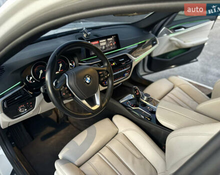 Белый БМВ 5 Серия, объемом двигателя 2 л и пробегом 70 тыс. км за 28888 $, фото 96 на Automoto.ua