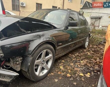 Черный БМВ 5 Серия, объемом двигателя 2.5 л и пробегом 460 тыс. км за 2360 $, фото 1 на Automoto.ua