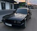 Черный БМВ 5 Серия, объемом двигателя 2.5 л и пробегом 400 тыс. км за 2500 $, фото 1 на Automoto.ua