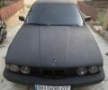 Черный БМВ 5 Серия, объемом двигателя 2.5 л и пробегом 515 тыс. км за 1800 $, фото 1 на Automoto.ua