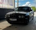 Черный БМВ 5 Серия, объемом двигателя 2.5 л и пробегом 10 тыс. км за 2555 $, фото 1 на Automoto.ua