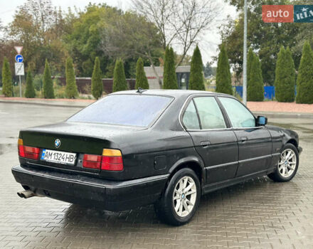 Черный БМВ 5 Серия, объемом двигателя 2.5 л и пробегом 300 тыс. км за 1650 $, фото 1 на Automoto.ua