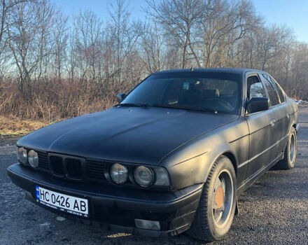 Чорний БМВ 5 Серія, об'ємом двигуна 2.5 л та пробігом 370 тис. км за 2050 $, фото 1 на Automoto.ua