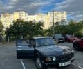 Чорний БМВ 5 Серія, об'ємом двигуна 2 л та пробігом 400 тис. км за 1119 $, фото 1 на Automoto.ua