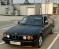 Черный БМВ 5 Серия, объемом двигателя 2.5 л и пробегом 500 тыс. км за 2200 $, фото 1 на Automoto.ua