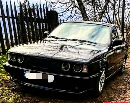 Черный БМВ 5 Серия, объемом двигателя 2.5 л и пробегом 150 тыс. км за 1550 $, фото 1 на Automoto.ua