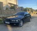 Чорний БМВ 5 Серія, об'ємом двигуна 2.5 л та пробігом 593 тис. км за 3300 $, фото 1 на Automoto.ua