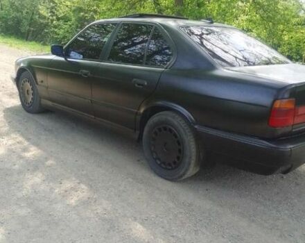 Черный БМВ 5 Серия, объемом двигателя 2.5 л и пробегом 220 тыс. км за 1890 $, фото 1 на Automoto.ua