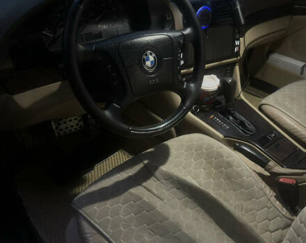 Черный БМВ 5 Серия, объемом двигателя 2.8 л и пробегом 340 тыс. км за 5999 $, фото 11 на Automoto.ua