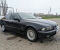 Черный БМВ 5 Серия, объемом двигателя 3.5 л и пробегом 267 тыс. км за 4000 $, фото 1 на Automoto.ua
