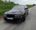 Черный БМВ 5 Серия, объемом двигателя 3 л и пробегом 460 тыс. км за 6990 $, фото 1 на Automoto.ua