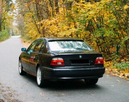 Черный БМВ 5 Серия, объемом двигателя 4.4 л и пробегом 400 тыс. км за 13000 $, фото 5 на Automoto.ua