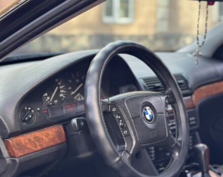 Черный БМВ 5 Серия, объемом двигателя 2.5 л и пробегом 300 тыс. км за 4999 $, фото 9 на Automoto.ua