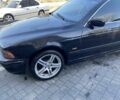 Чорний БМВ 5 Серія, об'ємом двигуна 2.5 л та пробігом 400 тис. км за 3500 $, фото 1 на Automoto.ua