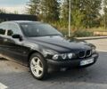 Черный БМВ 5 Серия, объемом двигателя 2.5 л и пробегом 426 тыс. км за 4123 $, фото 1 на Automoto.ua