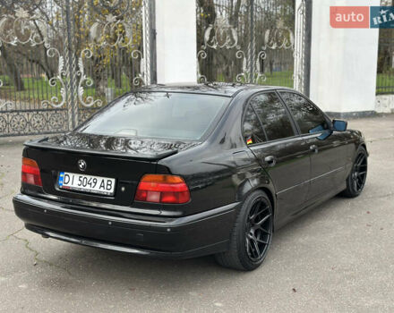 Черный БМВ 5 Серия, объемом двигателя 2.79 л и пробегом 303 тыс. км за 3999 $, фото 2 на Automoto.ua
