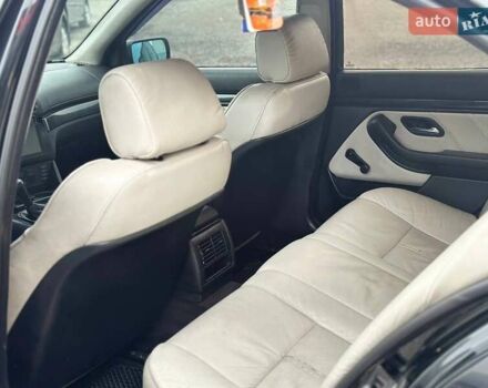 Черный БМВ 5 Серия, объемом двигателя 2.5 л и пробегом 420 тыс. км за 4300 $, фото 7 на Automoto.ua