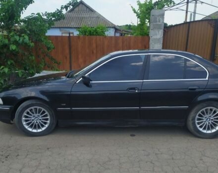 Черный БМВ 5 Серия, объемом двигателя 2.5 л и пробегом 150 тыс. км за 3200 $, фото 1 на Automoto.ua
