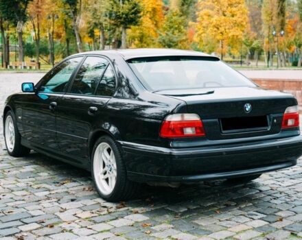 Черный БМВ 5 Серия, объемом двигателя 4.4 л и пробегом 400 тыс. км за 13000 $, фото 7 на Automoto.ua