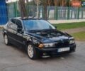 Черный БМВ 5 Серия, объемом двигателя 2.79 л и пробегом 305 тыс. км за 3800 $, фото 1 на Automoto.ua