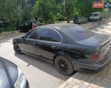 Черный БМВ 5 Серия, объемом двигателя 2 л и пробегом 1000 тыс. км за 4200 $, фото 1 на Automoto.ua