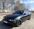 Черный БМВ 5 Серия, объемом двигателя 2.5 л и пробегом 400 тыс. км за 3100 $, фото 1 на Automoto.ua