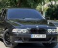 Черный БМВ 5 Серия, объемом двигателя 2.5 л и пробегом 270 тыс. км за 4350 $, фото 1 на Automoto.ua