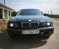 Черный БМВ 5 Серия, объемом двигателя 2.5 л и пробегом 347 тыс. км за 2250 $, фото 1 на Automoto.ua