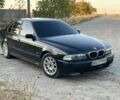 Черный БМВ 5 Серия, объемом двигателя 2.8 л и пробегом 280 тыс. км за 2600 $, фото 1 на Automoto.ua