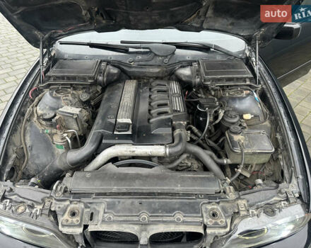 Черный БМВ 5 Серия, объемом двигателя 2.5 л и пробегом 460 тыс. км за 4800 $, фото 20 на Automoto.ua