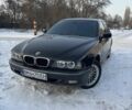 Черный БМВ 5 Серия, объемом двигателя 4 л и пробегом 320 тыс. км за 4500 $, фото 1 на Automoto.ua
