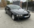 Черный БМВ 5 Серия, объемом двигателя 2.5 л и пробегом 600 тыс. км за 2300 $, фото 1 на Automoto.ua
