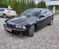 Черный БМВ 5 Серия, объемом двигателя 2.5 л и пробегом 530 тыс. км за 5500 $, фото 1 на Automoto.ua